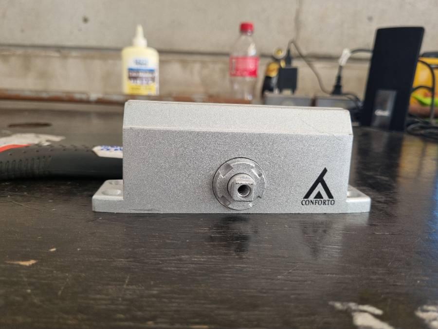Dobradiça hidráulica para porta