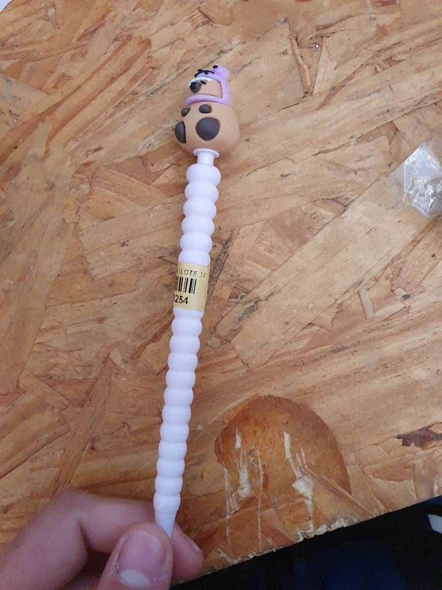 Caneta esferográfica com topo decorativo de personagem