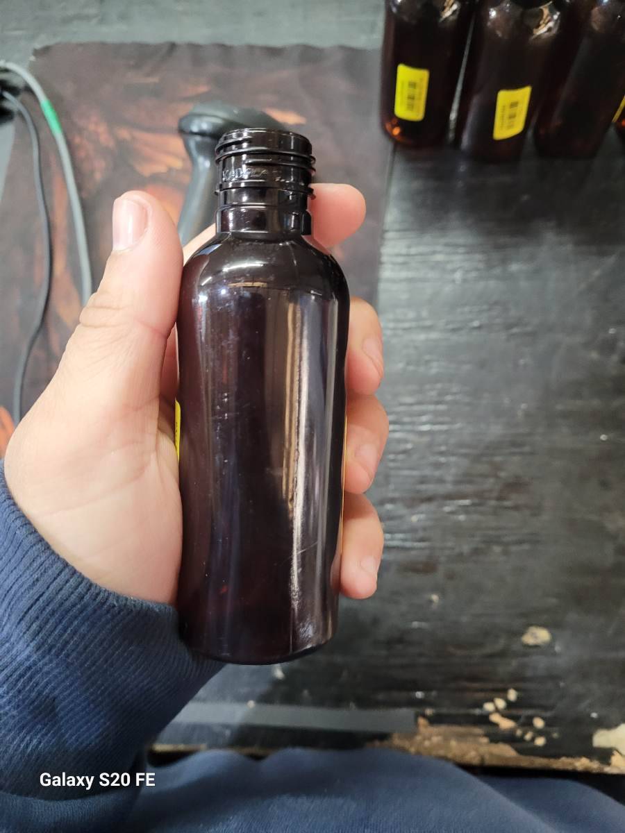 Frasco plástico marrom