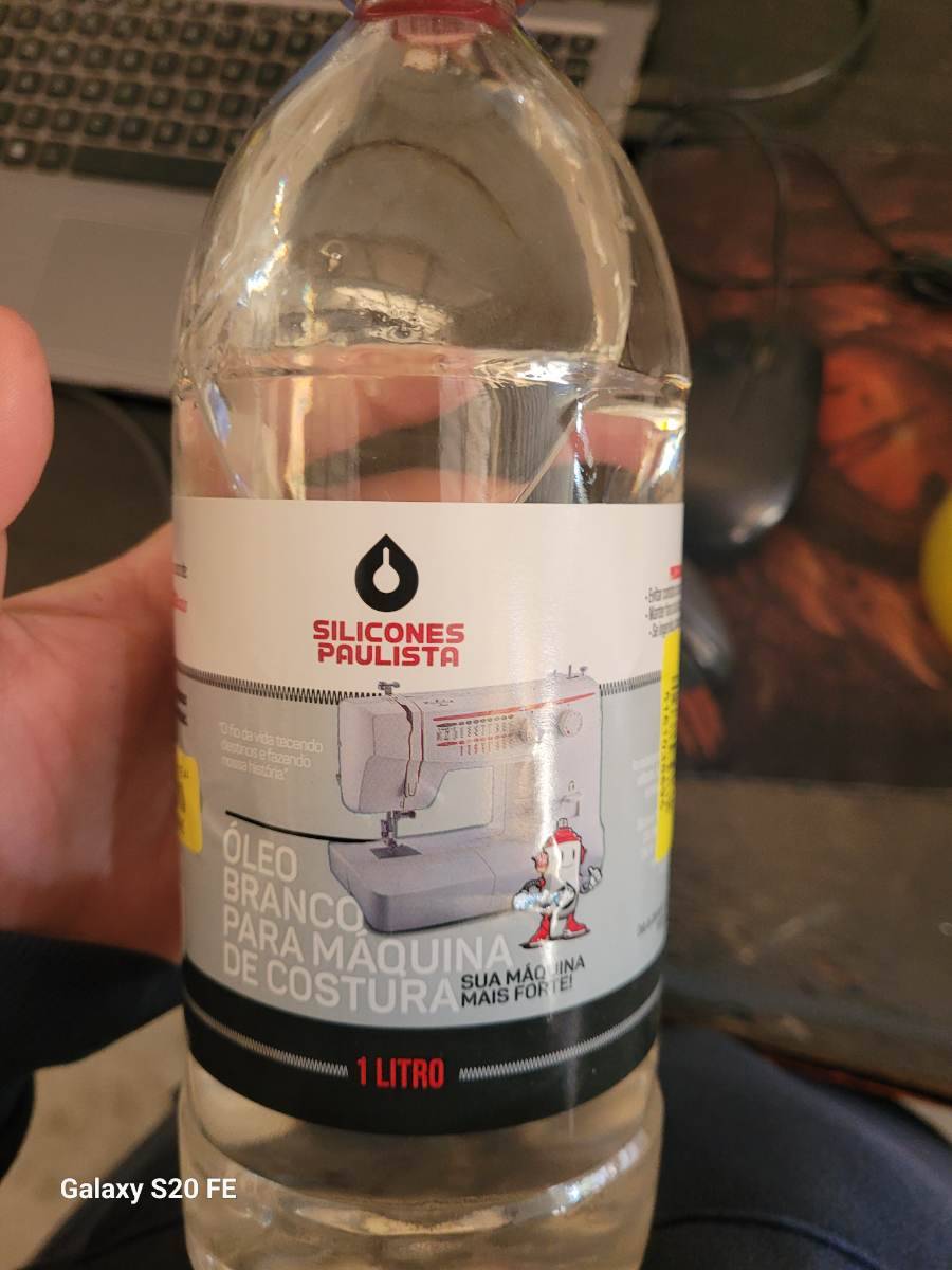 Óleo branco para máquina de costura