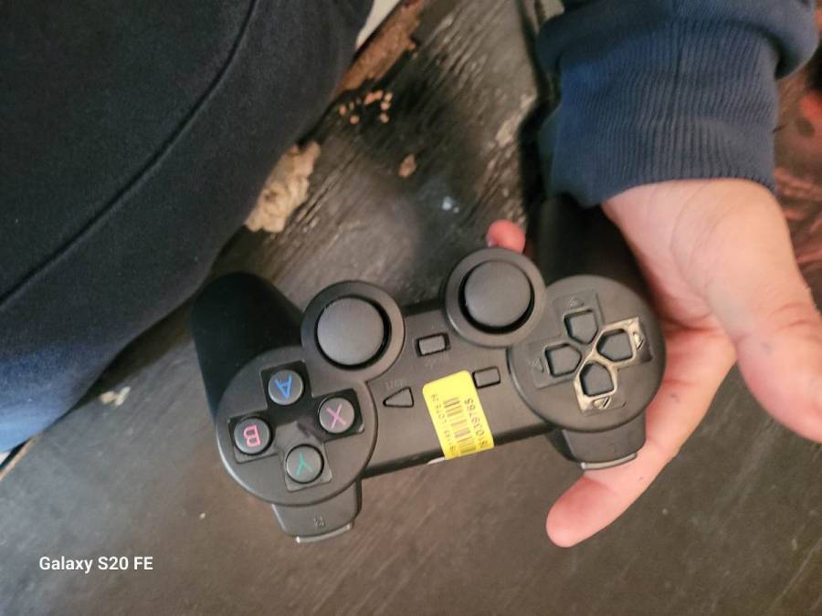 Controle de videogame preto