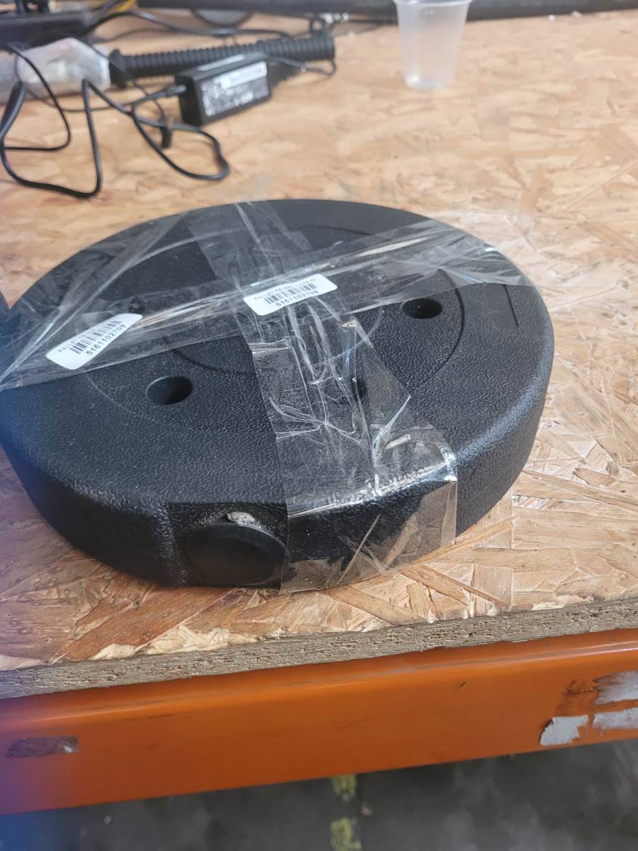 Base redonda plástica preta para suporte ou equipamento